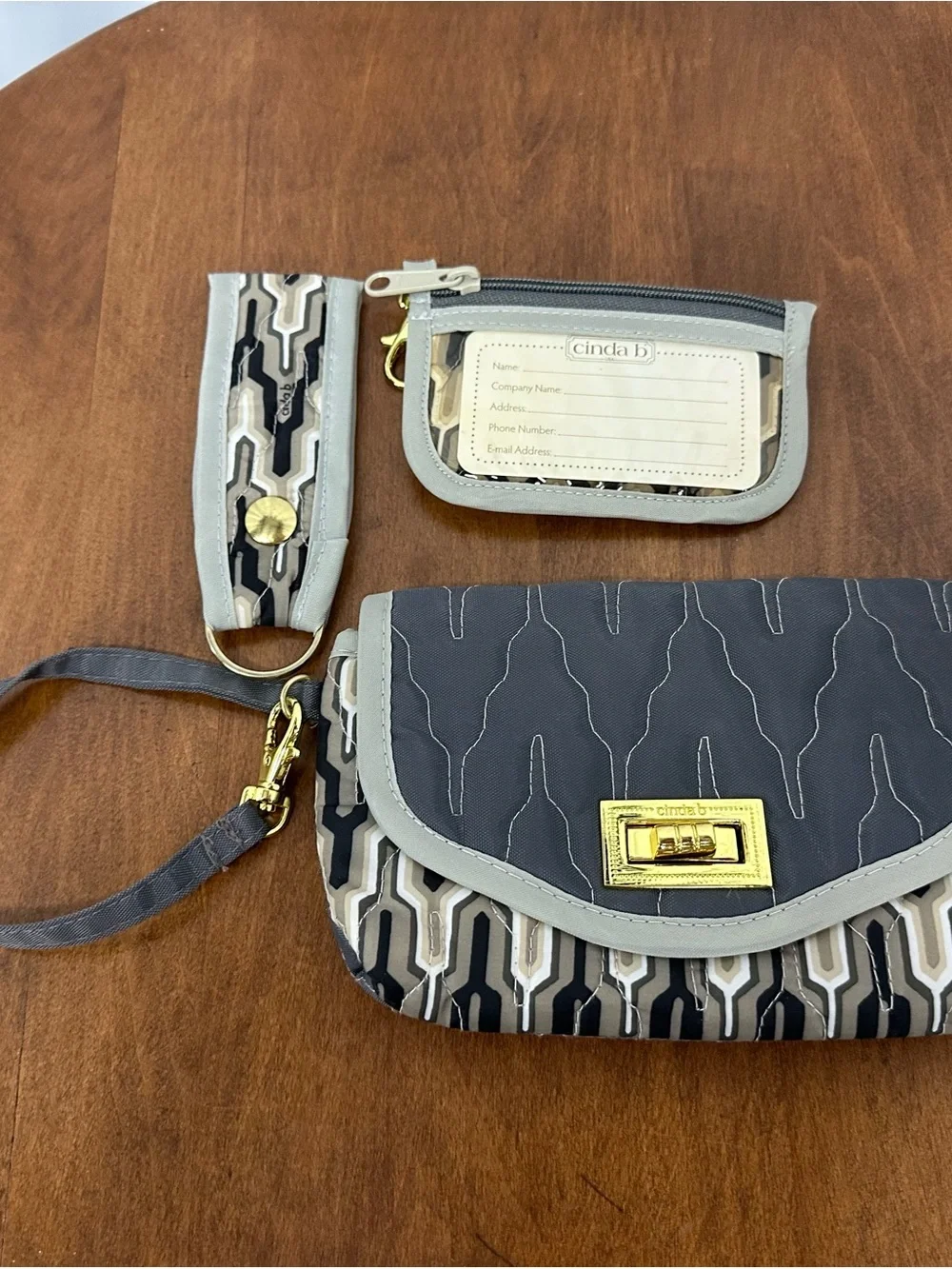 Cinda B Gray and Cream Geometric Wristlet Clutch with Keychain and card holder
